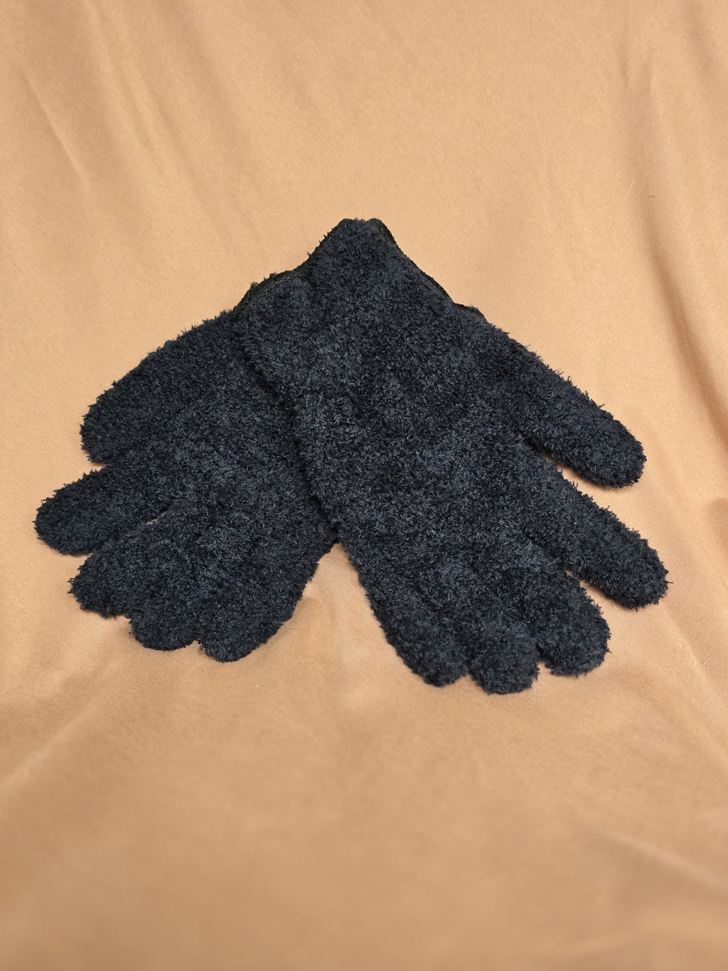 Pair of black microfiber leaf cleaning gloves laid flat