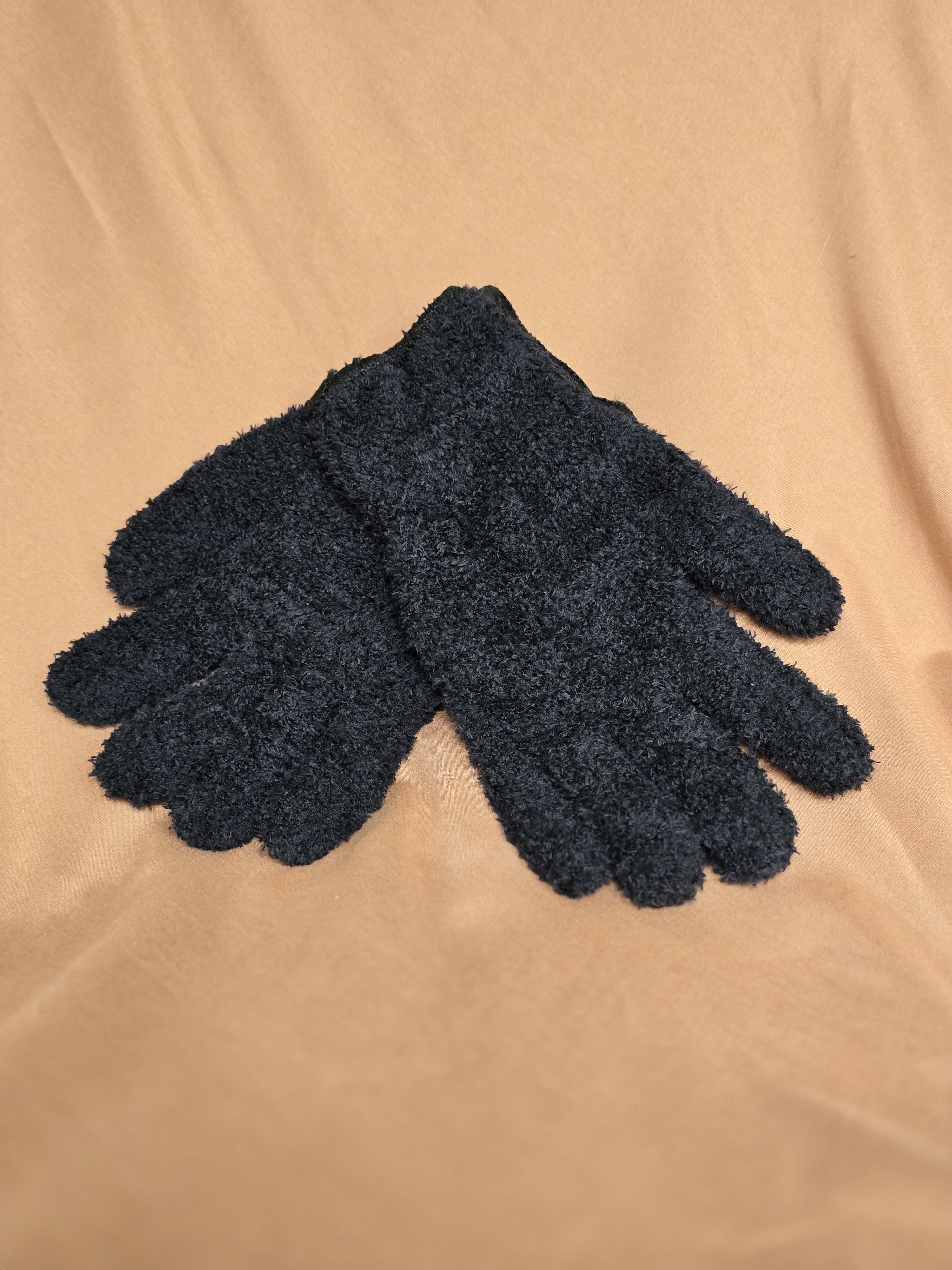 Pair of black microfiber leaf cleaning gloves laid flat